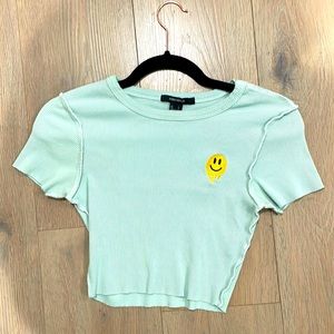 Rib Knit Green Crop Top with Drippy Smily Face